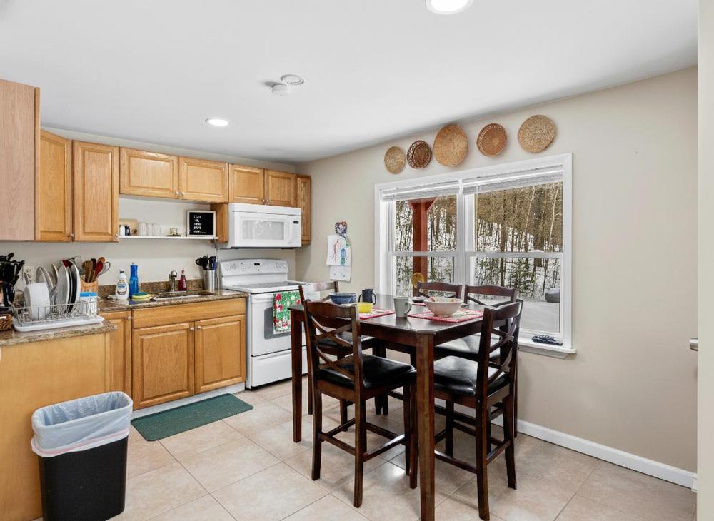 Kitchen before preparation - countertops cluttered with items